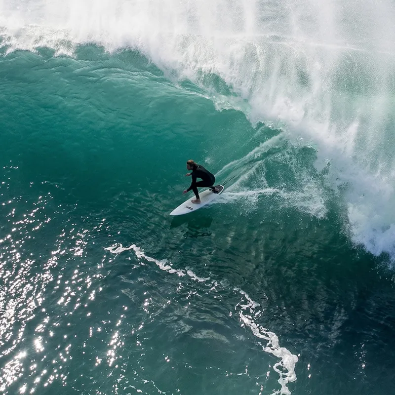 Aerial drone video of a surfer